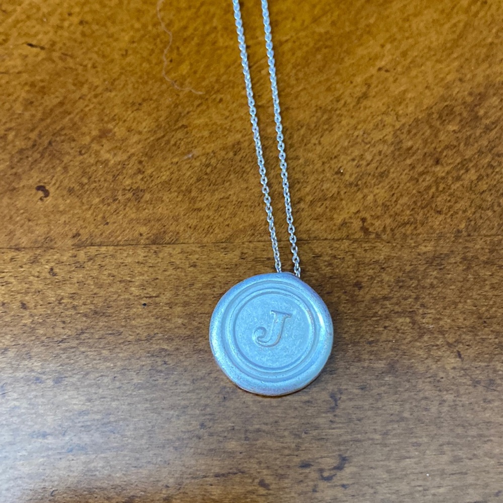 Silver J charm necklace